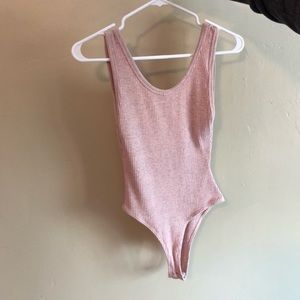 Baby pink body suit